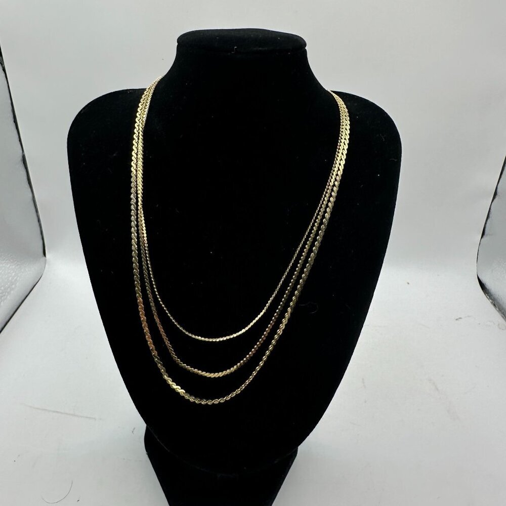 Gold-Toned Triple Strand Necklace With Lobster Clasp